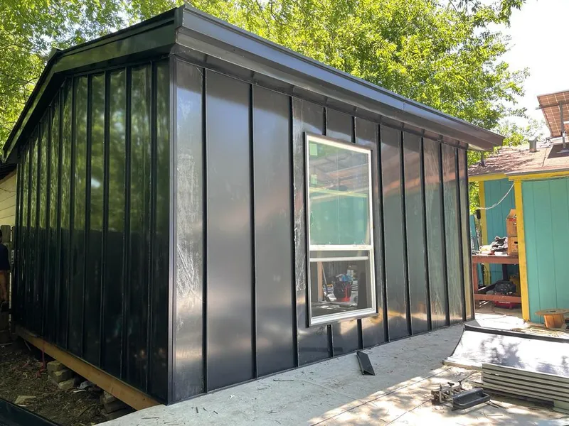 Black standing seam metal wall panels for Metal Roof Installation in West Samoset