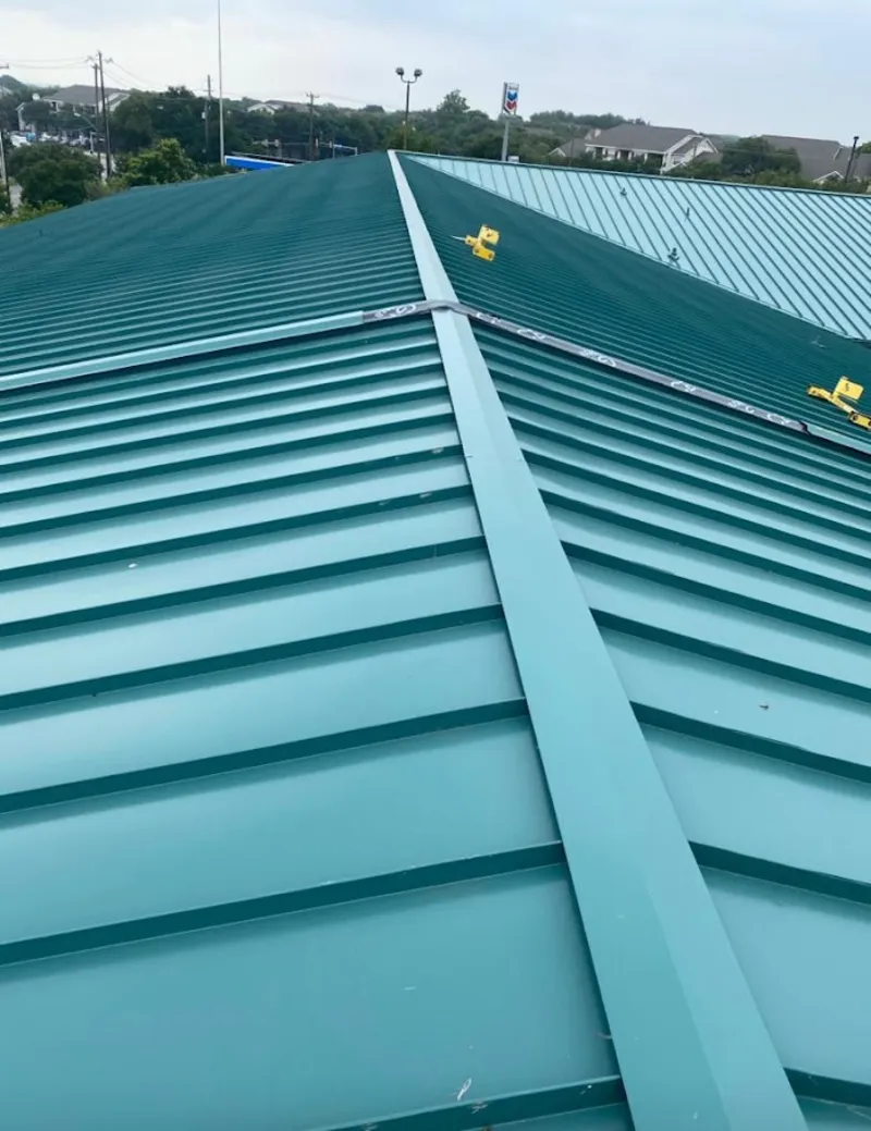 Green commercial metal roof ridge and valley for Metal Roof Repair in West Samoset