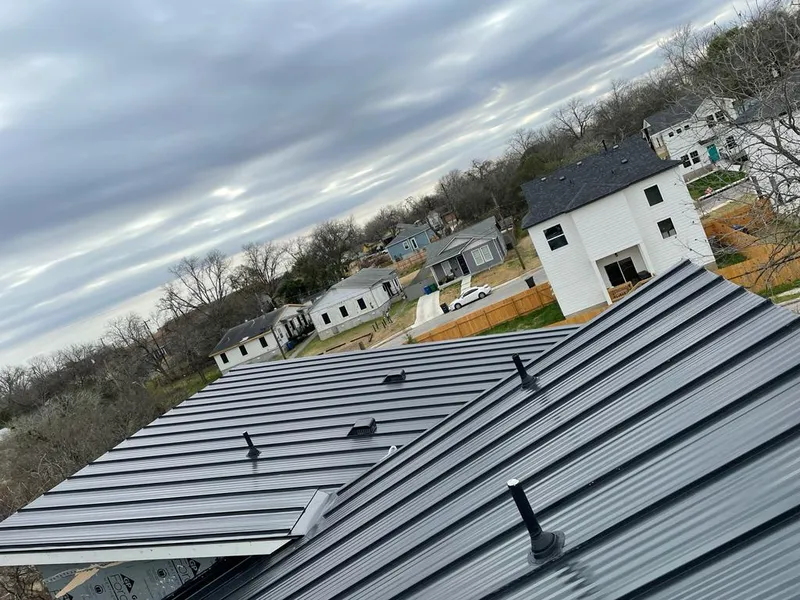 Standing seam metal roof panels with vents for Skylight Repair in West Samoset